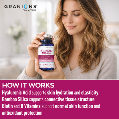 Woman holding a Granions supplement bottle with product details and benefits displayed.
